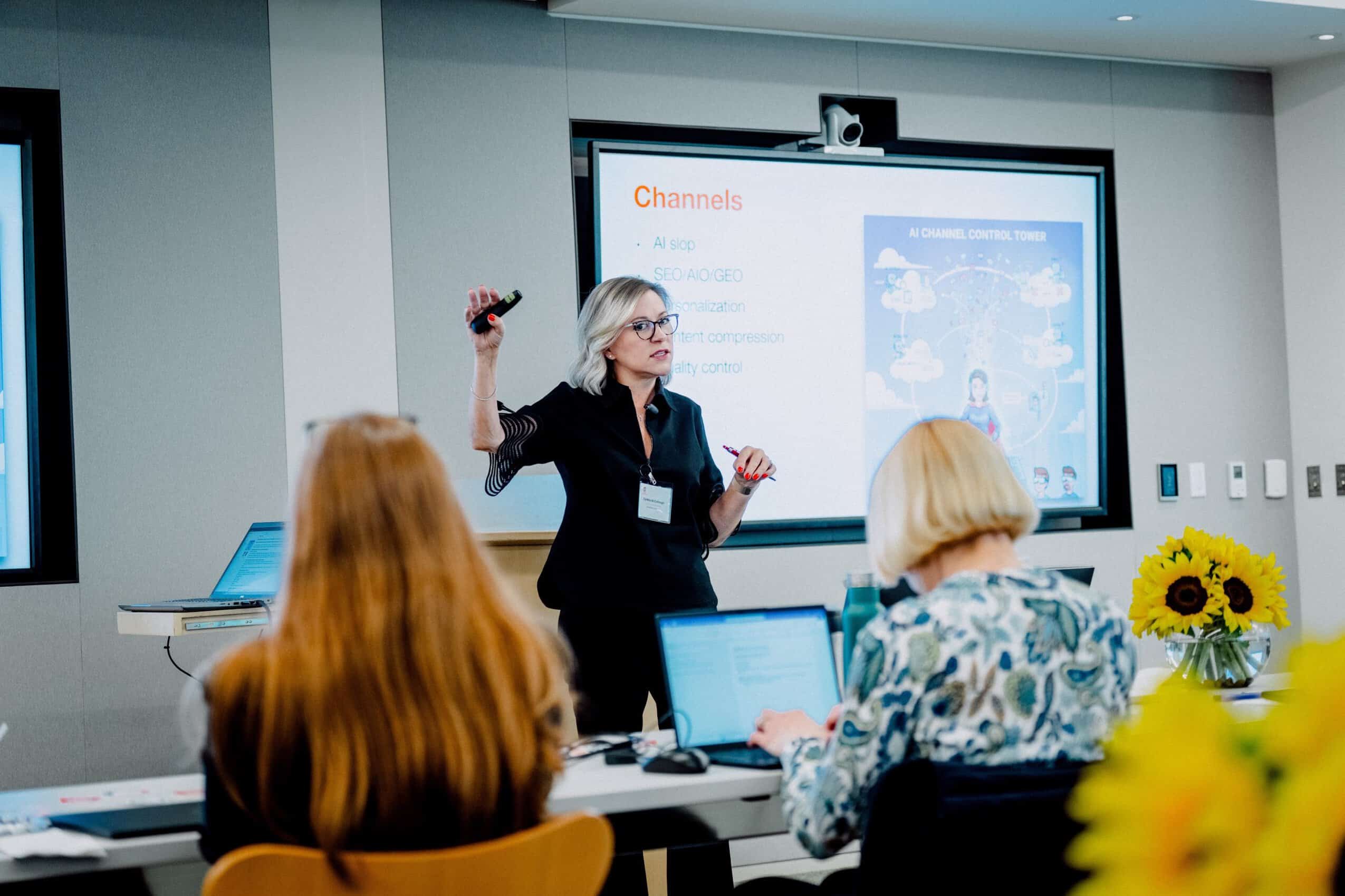 Cyndy McCollough presenting an AI program for legal marketers